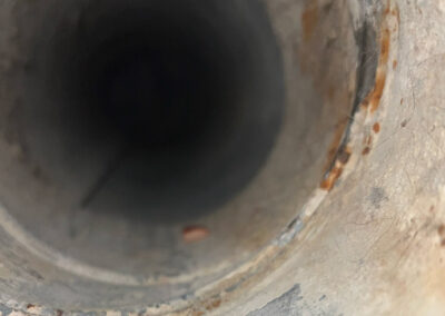 A dryer vent after thorough cleaning, with all the lint and debris removed, by American Clean Air.