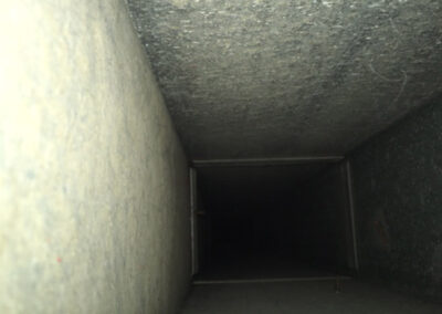 An air vent cleaned by American Clean Air, showcasing a clear, smooth, and unobstructed passageway.