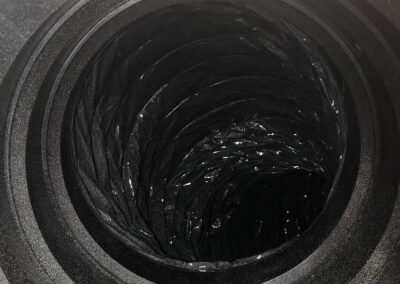 Clean and clear air duct interior after thorough cleaning American Clean Air, with no visible dust or debris, showing a restored, smooth surface.