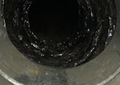 Clean and clear air duct after American Clean Air's debris removal, with no visible obstructions, allowing for improved airflow and better air quality.